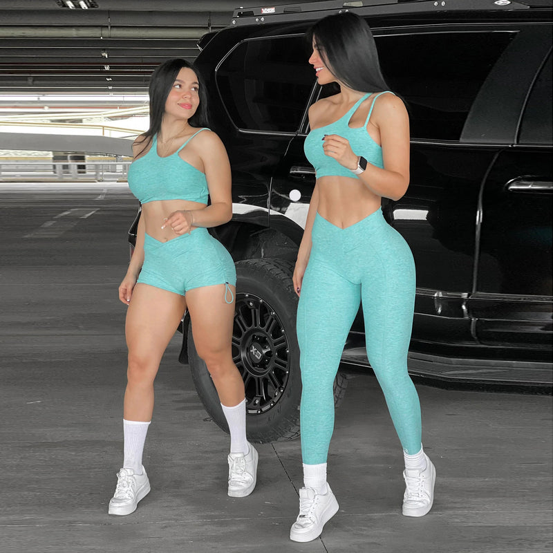 Mintgrüner Gymnastik-BH, Shorts und Hose